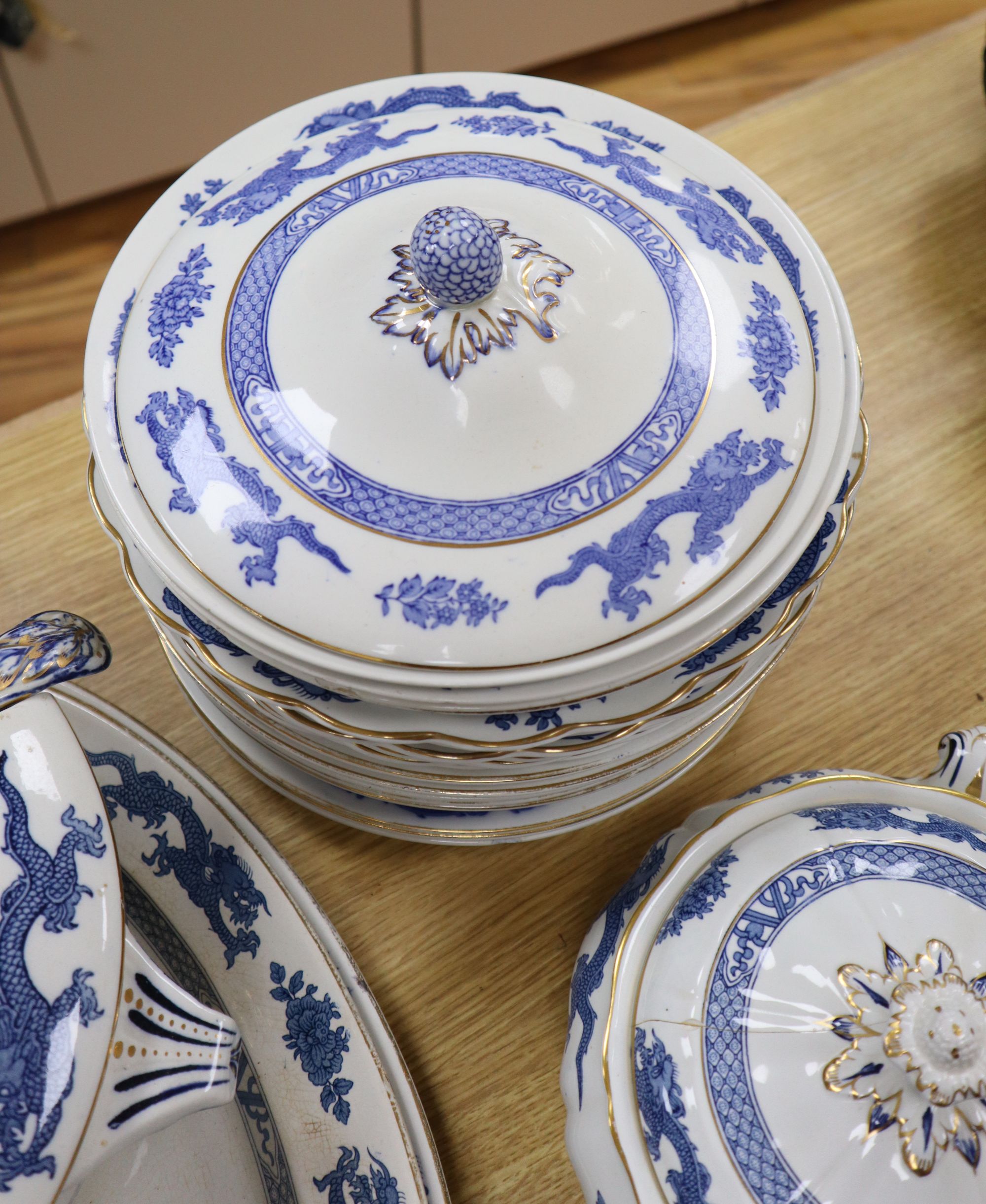 A Booths blue and white dragon pattern part service